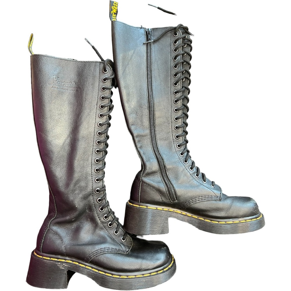 Dr. Martens knee high leather black boots size US 6. Side zip, 2” heel.